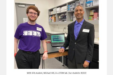 With SFA student, Michael Hill, in a STEM lab. Our students ROCK!