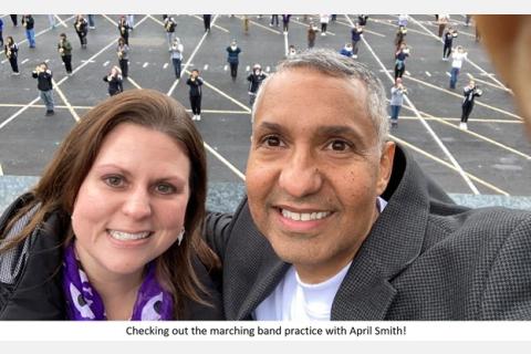 checking out the marching band practice with April Smith