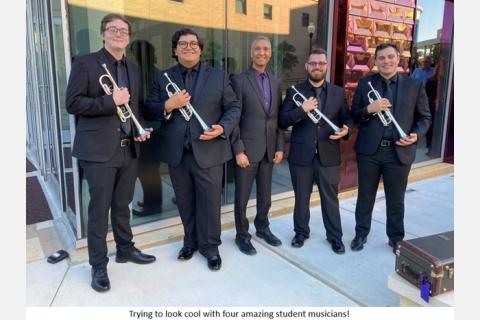 trying to look cool with four amazing student musicians
