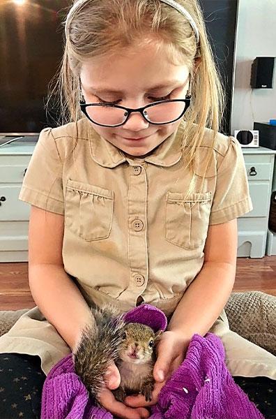 Snuggling with Chloe was a favorite pastime. Photo courtesy of DeAnna Prunés.