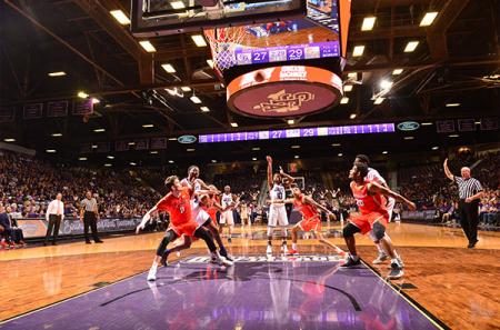 SFA basketball team in action