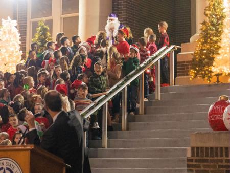 Students performing at Holiday on the Plaza