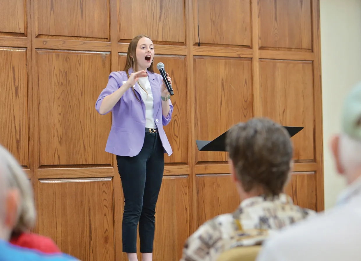 Brittany Scott leading a Parkinson Project Voice group