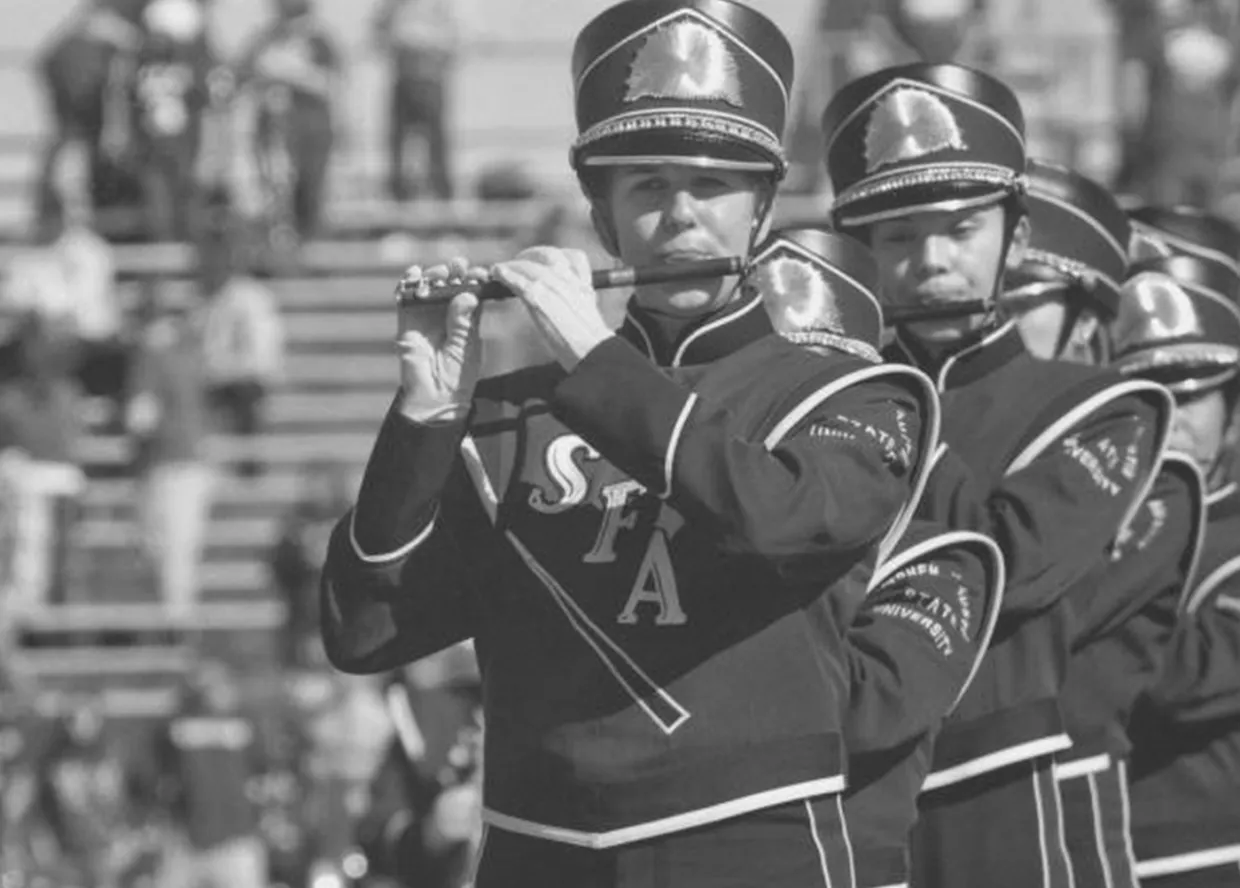 Lumberjack Marching Band performing on the field