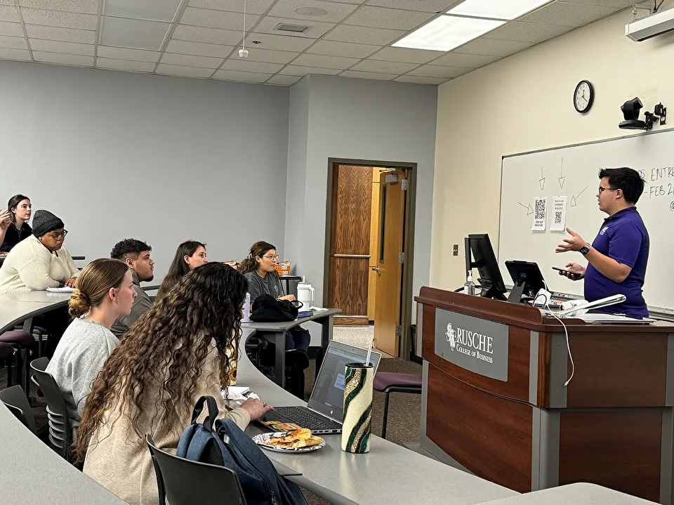 Students attending a club meeting