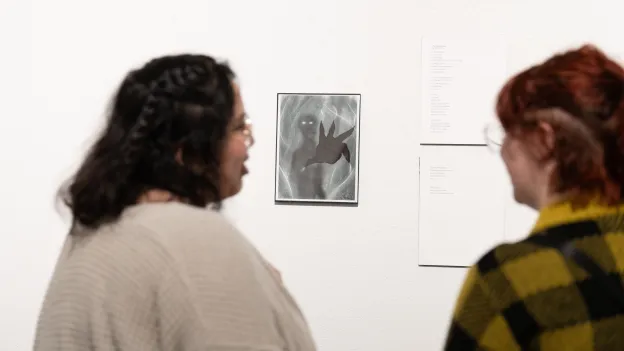 student's artwork on display during an exhibit