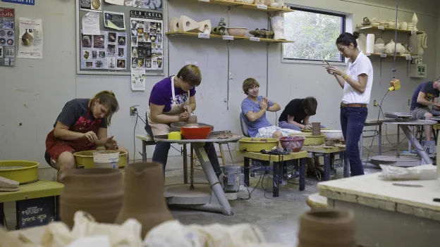 Students working in the ceramics studio