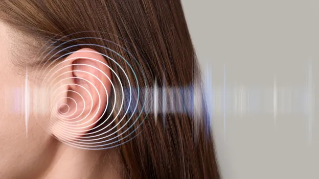 Closeup of an ear and graphic rings