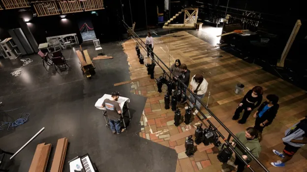 Theatre students working on set design