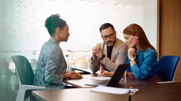 financial planner meeting with clients