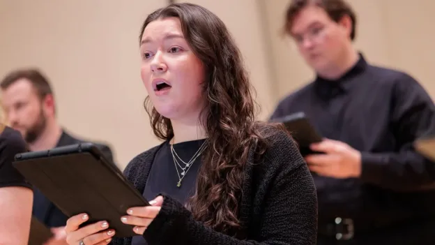 Student performing in choir