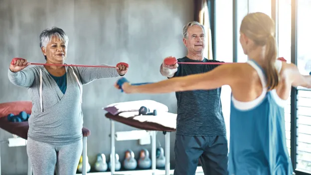 Exercise, workout and strength progress of mature clients in wellness class or gym