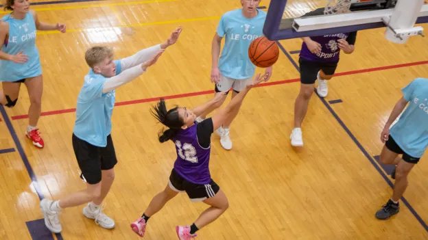 Students playing basketball