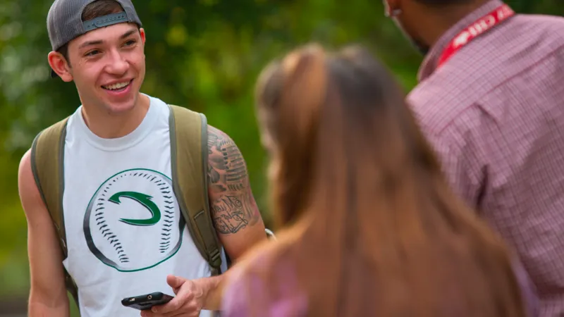 Student chats with other students