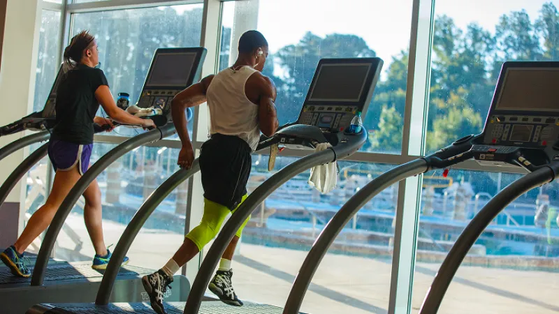 Student runs on a treadmill