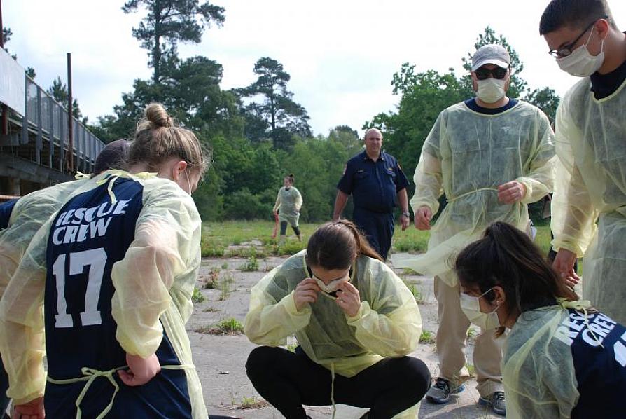 SFA senior nursing students and trainees from the Nacogdoches Fire Department work together during a recent disaster drill.
