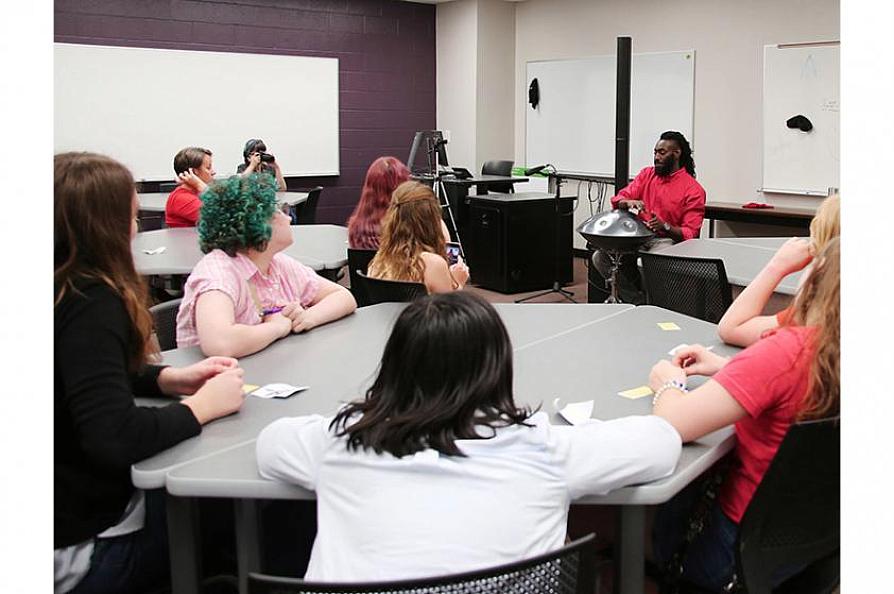 Casey Muze with students