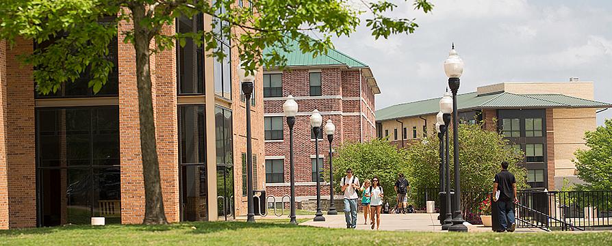 Human Services Building on left and student housing in background