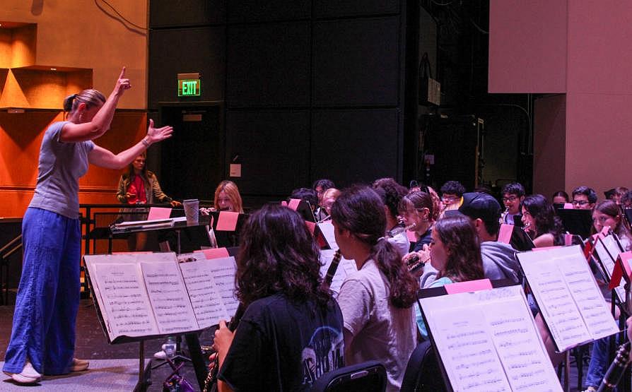 Students rehearse on stage during band camp