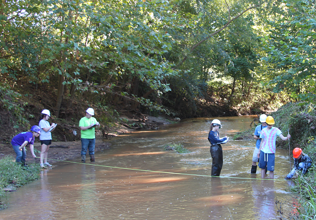 environmental science students in LaNana Creek