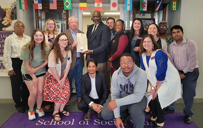SFA School of Social Work faculty, staff and students with County Commissioner Robin Dawley