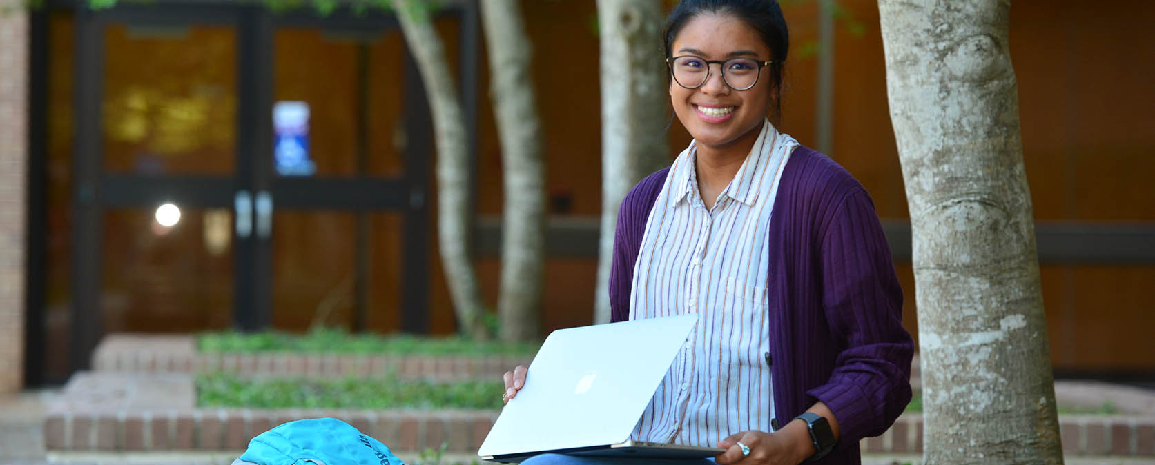 online degree programs student with laptop