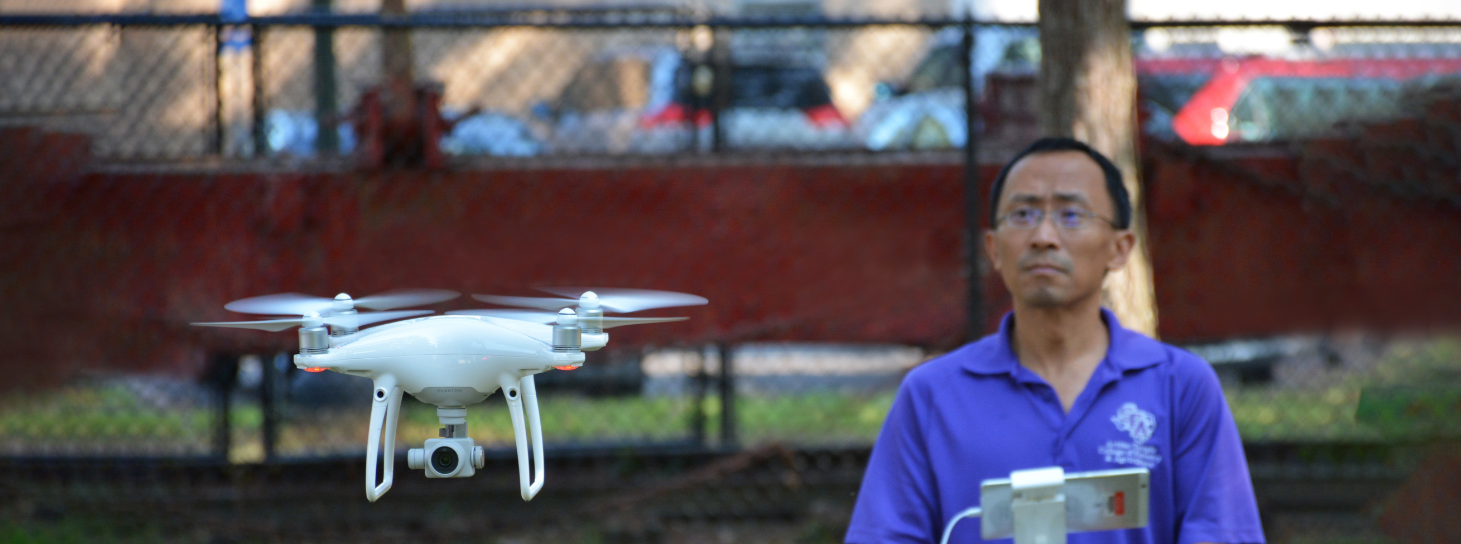 professor flying a drone