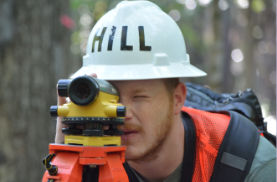 student taking laser measurments