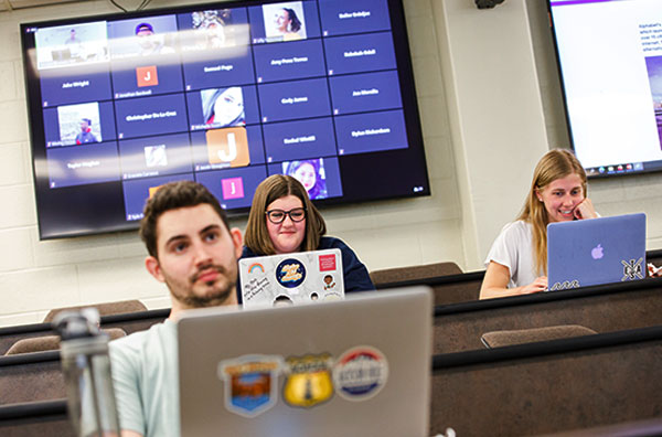 students in classroom and on zoom