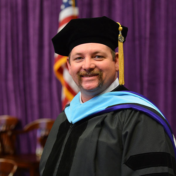 Dr. John Denson