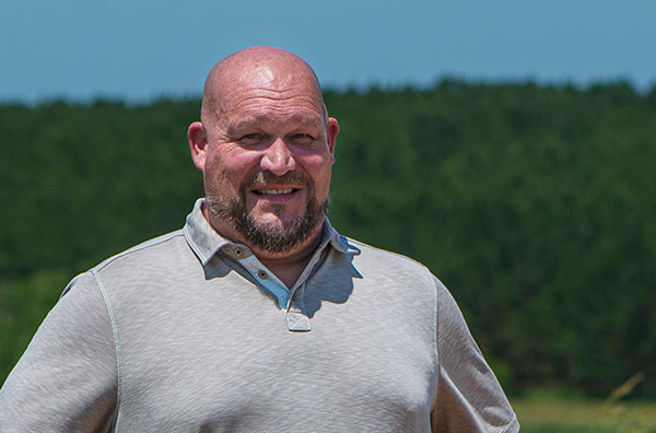 Dr. Eric Anderson standing outdoors