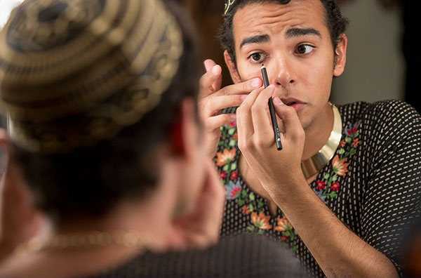 Student applying makeup