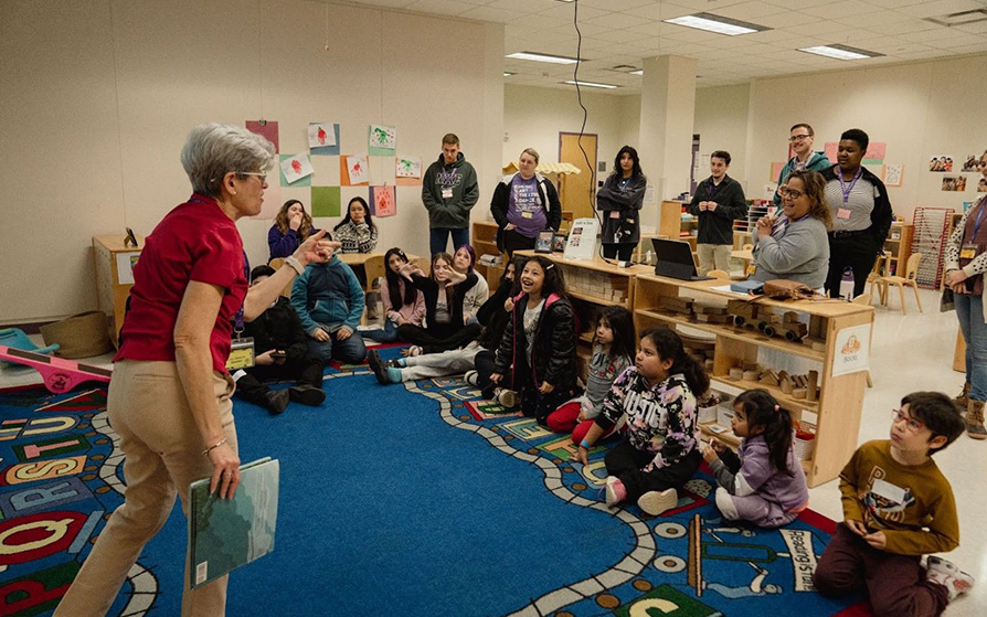 Author Lulu Delacre reads to students
