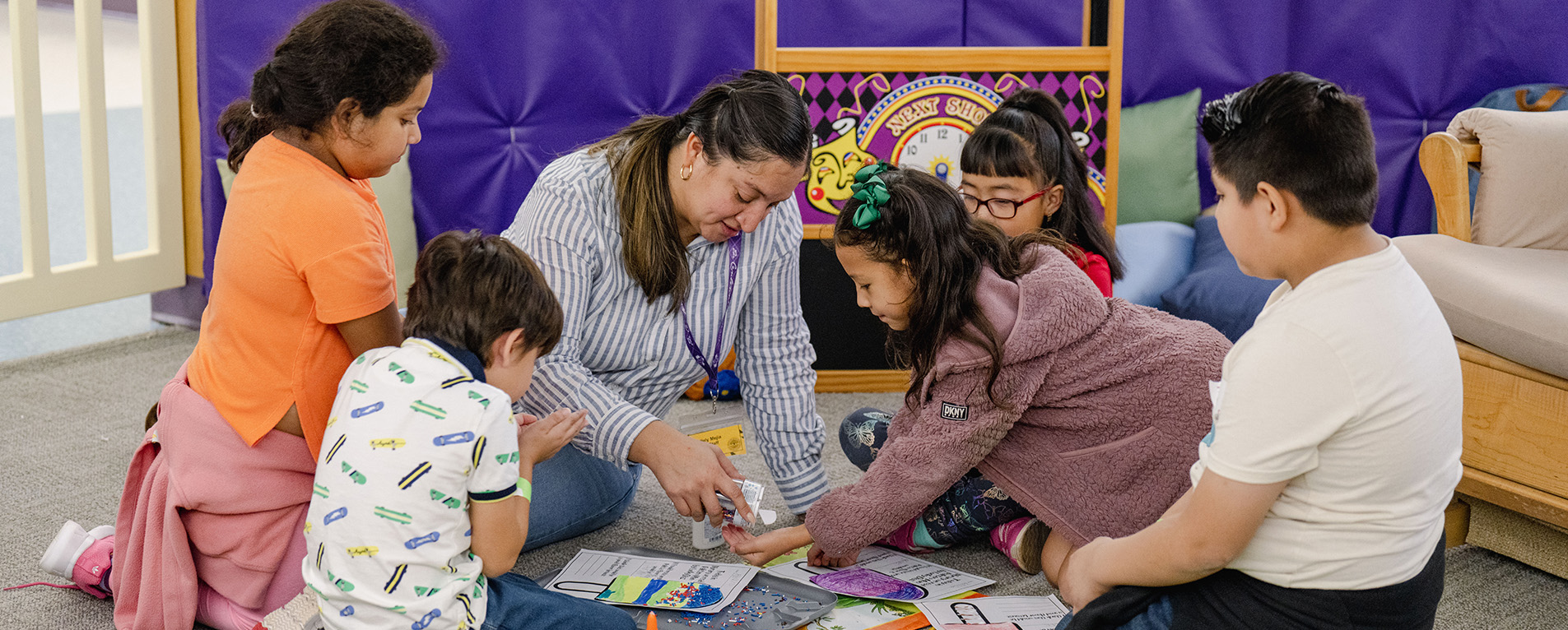 Teacher working with students at an LLA event