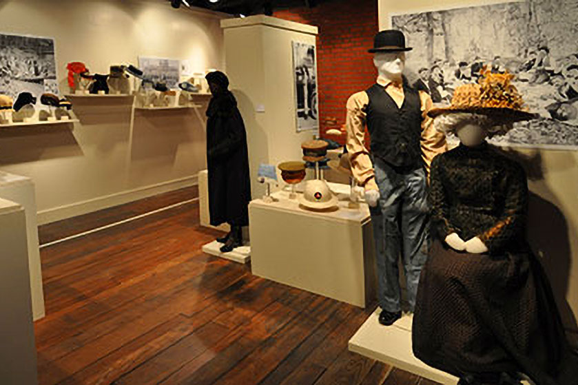 hat and clothing exhibit at the Stone Fort Museum