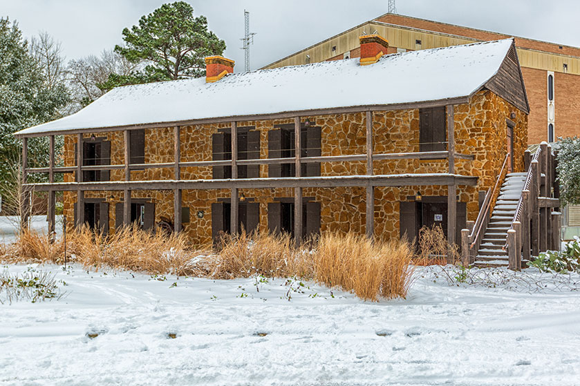 Stone Fort Museum in winter with snow