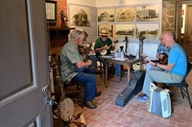 El Camino Real Nacogdoches band performing inside the Stone Fort Museum
