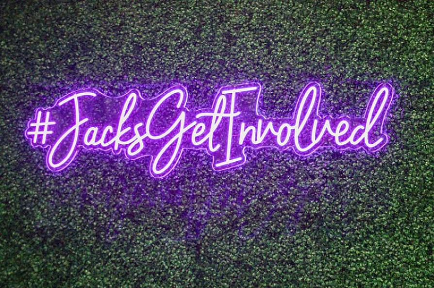 Neon Sign saying Jacks Get Involved