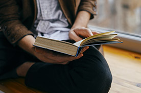 student reading a book