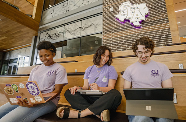 Students sitting in the STEM building