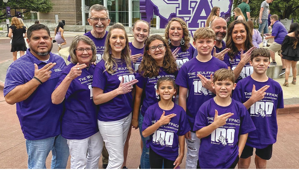 Erika Tolar posing with family members