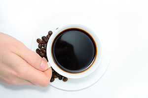 cup of coffee and coffee beans