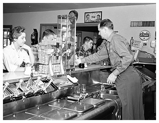 Elmer Childers serving customers