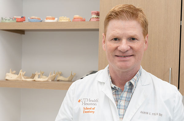 Dr. Aaron Polk owns Polk Dental Associates, serves as the dental care provider for SFA's student-athletes as part of the university's sports medicine team