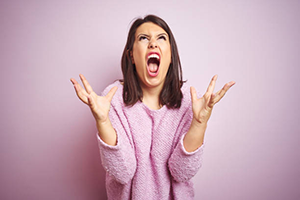 woman screaming in frustration