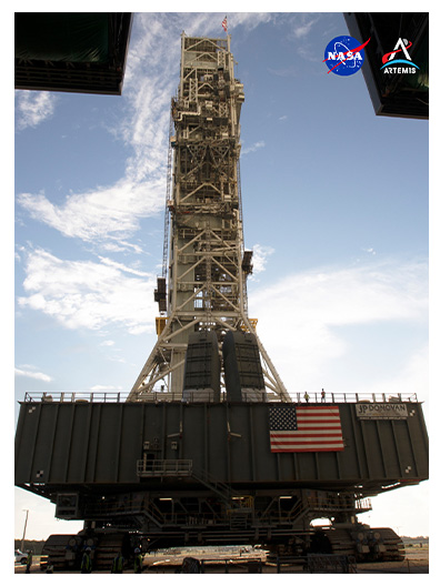 NASA's mobile launcher, atop Crawler Transporter-2, pictured at NASA's Kennedy Space Center in Florida on Sept. 8, 2018. This is the first time the modified mobile launcher made the trip to the pad and the vehicle assembly building. The mobile launcher is the structure used to assemble, process and launch the space launch system rocket.