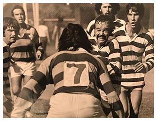 Bob Fleet playing rugby