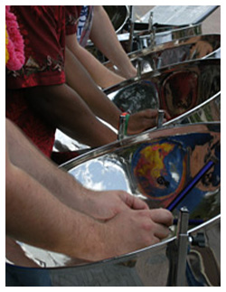 people playing steel pans