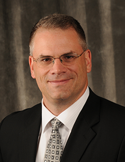 Dr. Chris Comer