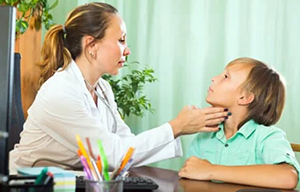 doctor examining child